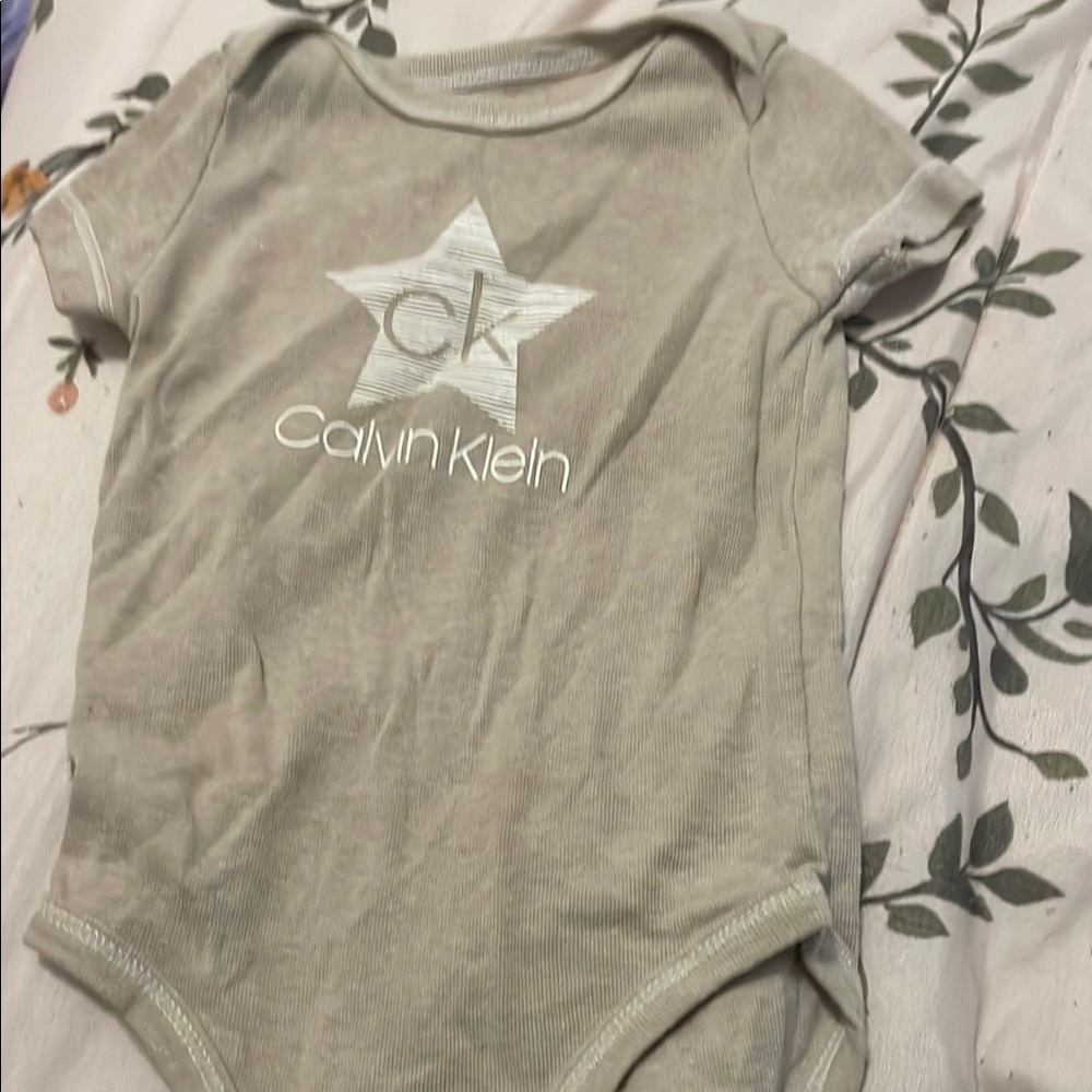 Calvin Klein Gray One Piece Bodysuit with Star Design